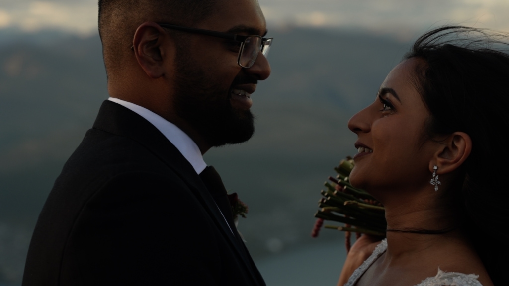 Bride and Groom crying on mountain