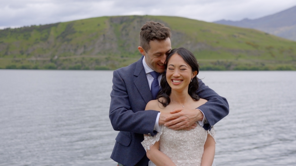 Bride and groom on the shores of Lake Wanaka